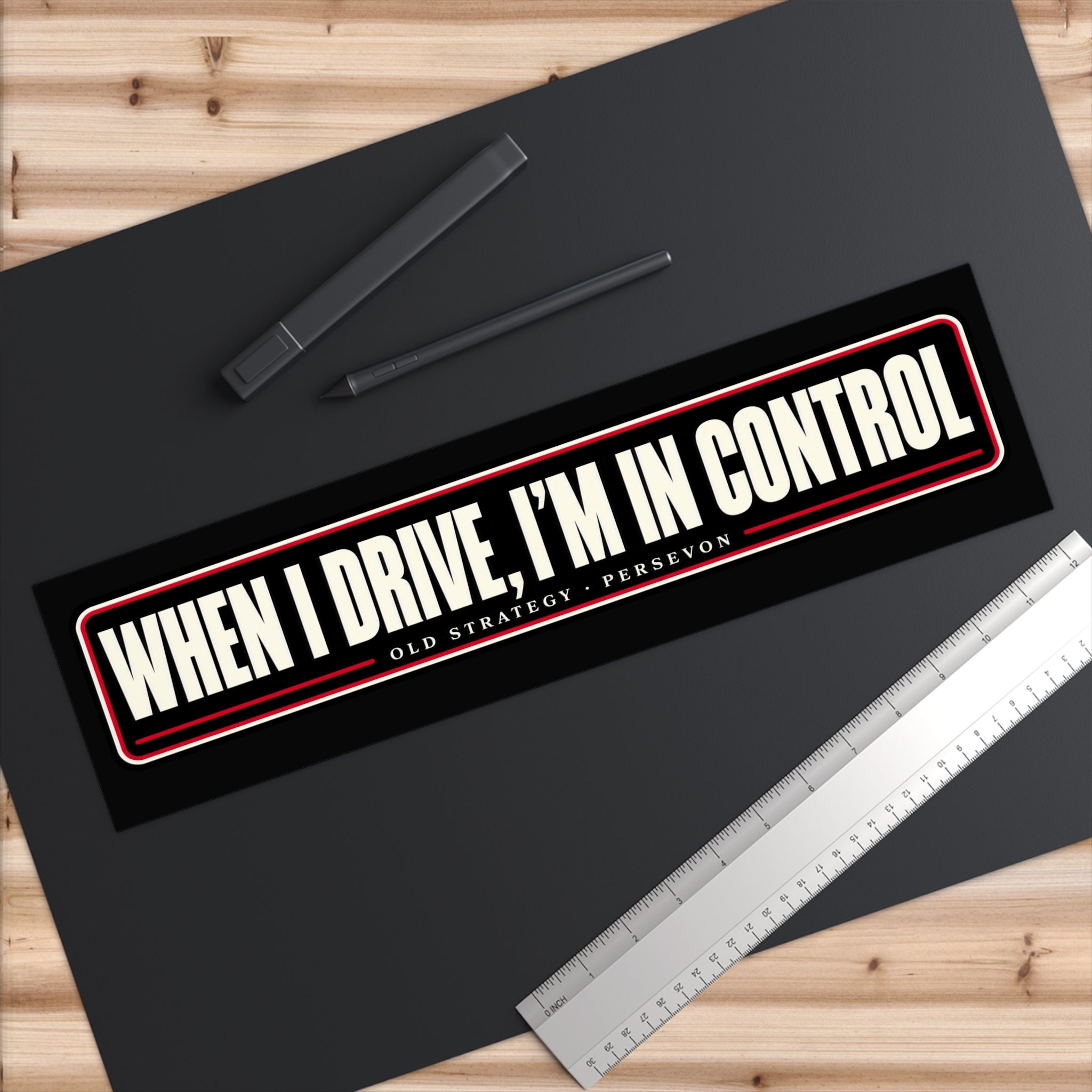 Close-up of When I Drive I'm in Control vinyl sticker text